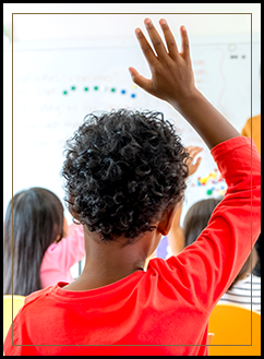 Male student raising his hand