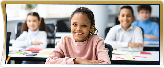 Happy, confident young lady in the classroom